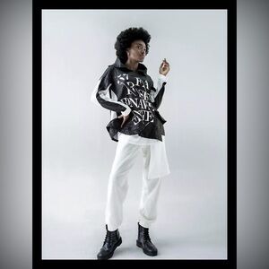 Black and white funnel neck top